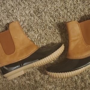 Black and light brown boots